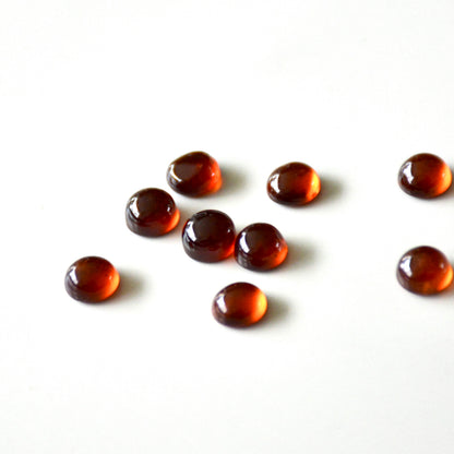 Hessoniet granaat | Cabochon rond | 6 mm