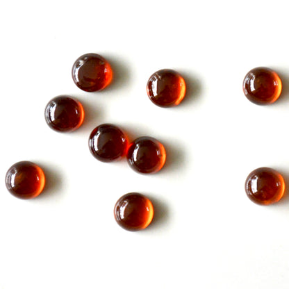 Hessoniet granaat | Cabochon rond | 6 mm