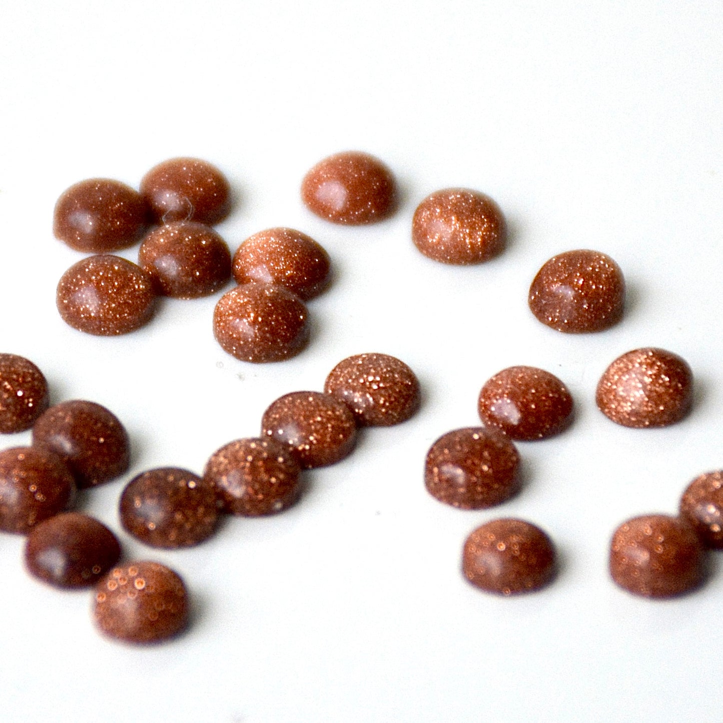 Goudsteen | Cabochon rond | 4 mm